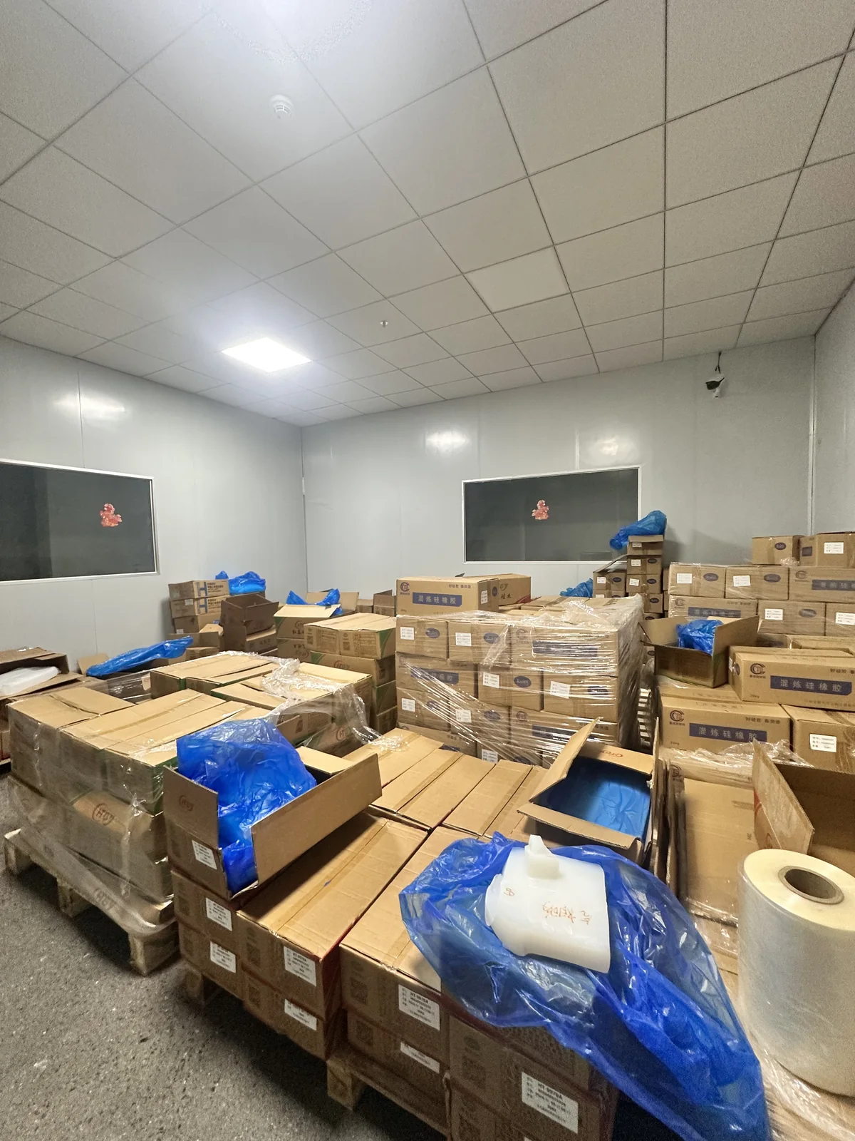 Material preparation room with worktables and supplies