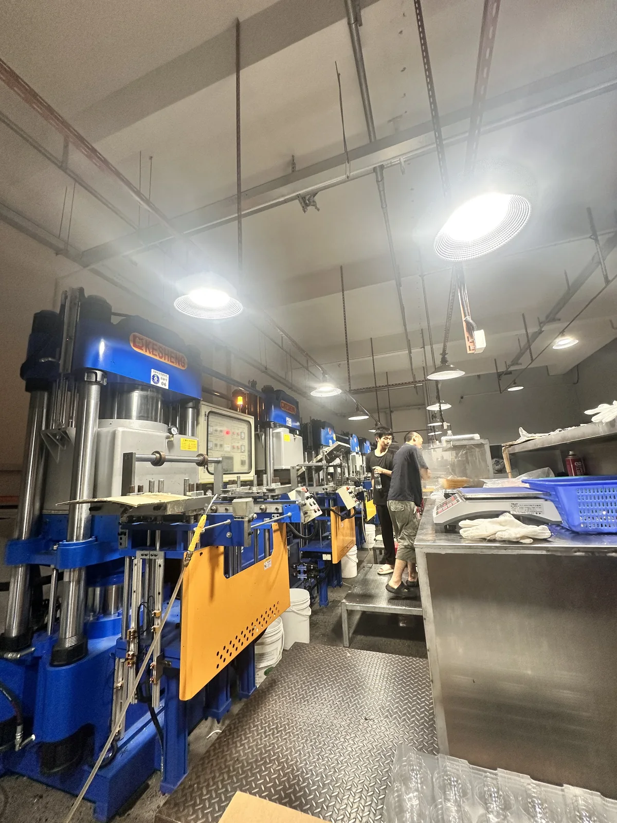 Aisle between silicone molding workstations